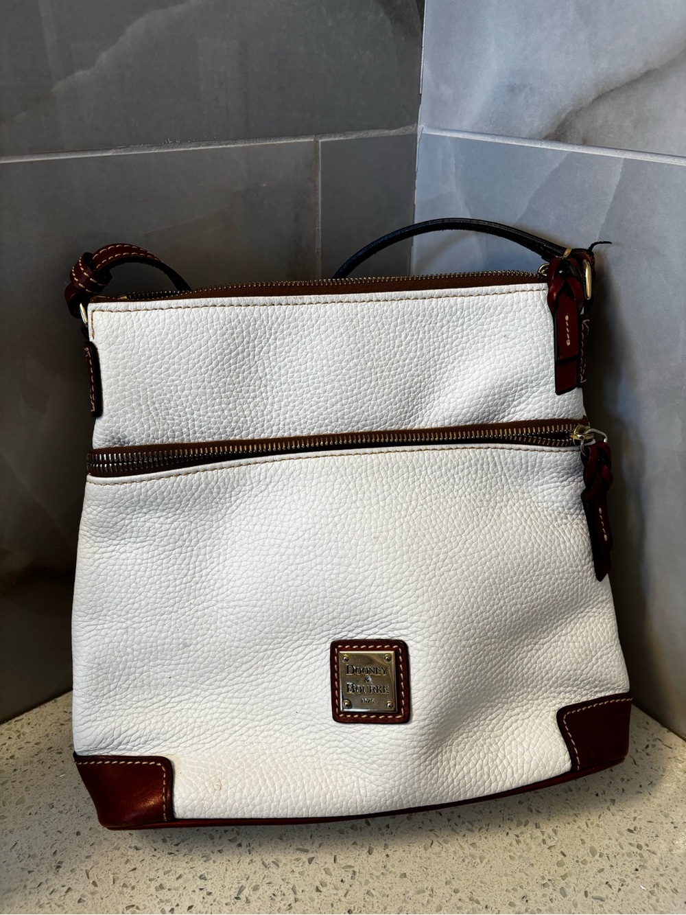Dooney & Bourke White Pebbled Leather Crossbody Bag with Brown Trim